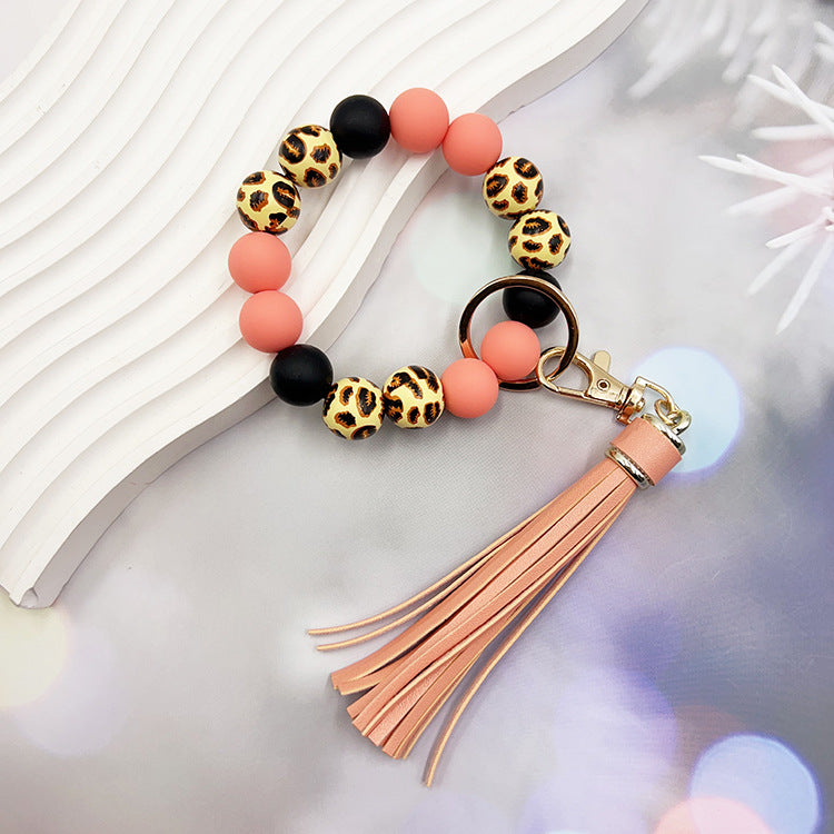Wholesale Leopard Print Wood Beads Silicone Beaded Bracelet Tassel Key Ring